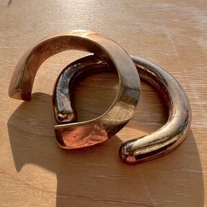 Brass (gold) cuff bangle bracelets.